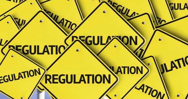 Regulation written on multiple road sign